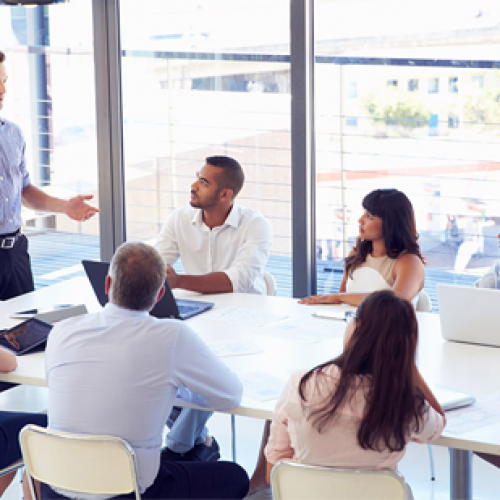 Man addressing a group meeting